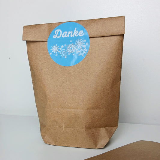 Mitgebseltüte: Verpackung für Gastgeschenk mit Schneeflocken Sticker