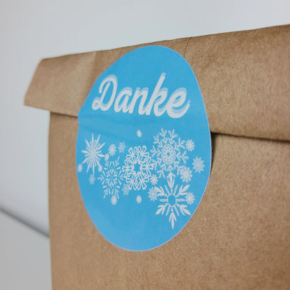 Mitgebseltüte: Verpackung für Gastgeschenk mit Schneeflocken Sticker